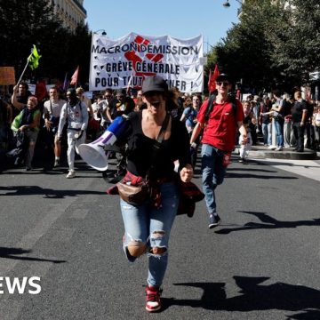 Workers across France strike over budget cut plans