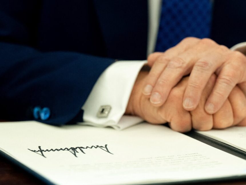 US President Donald Trump's signature is seen on an executive order in the Oval Office of the White House in Washington, DC, on February 14, 2025. (Photo by SAUL LOEB / AFP) (Photo by SAUL LOEB/AFP via Getty Images)