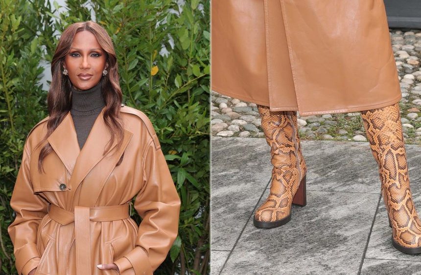 Iman Bowie arrives at the Tod's fashion show during the Milan Womenswear spring 2026 on Friday wearing the brand's Python Boots in Yellow.