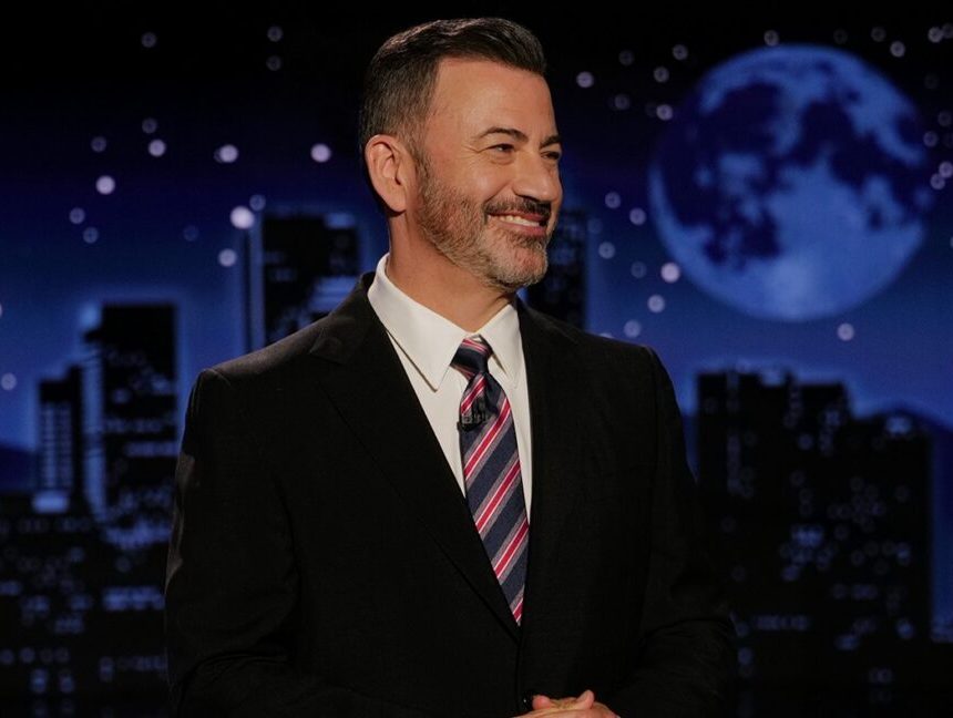 Jimmy Kimmel smiles while delivering a monologue.