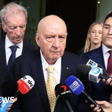 Sex abuse charges against top Australian radio host downgraded