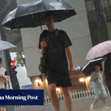 Hong Kong lowers typhoon signal to No 1 on Saturday, but storm Ragasa edges closer