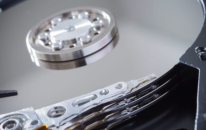 Image of silvery disks and small pivoting arms.