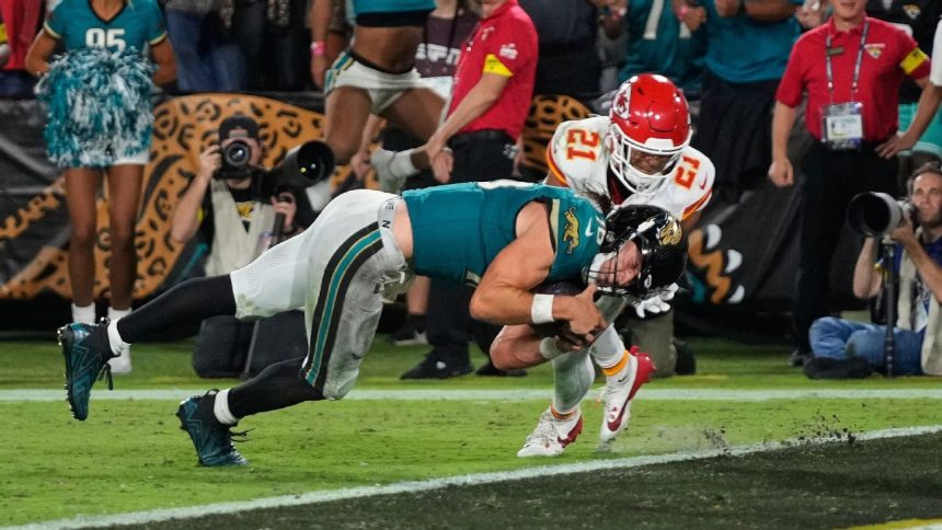 Jags’ Trevor Lawrence stumbles, recovers for winning TD