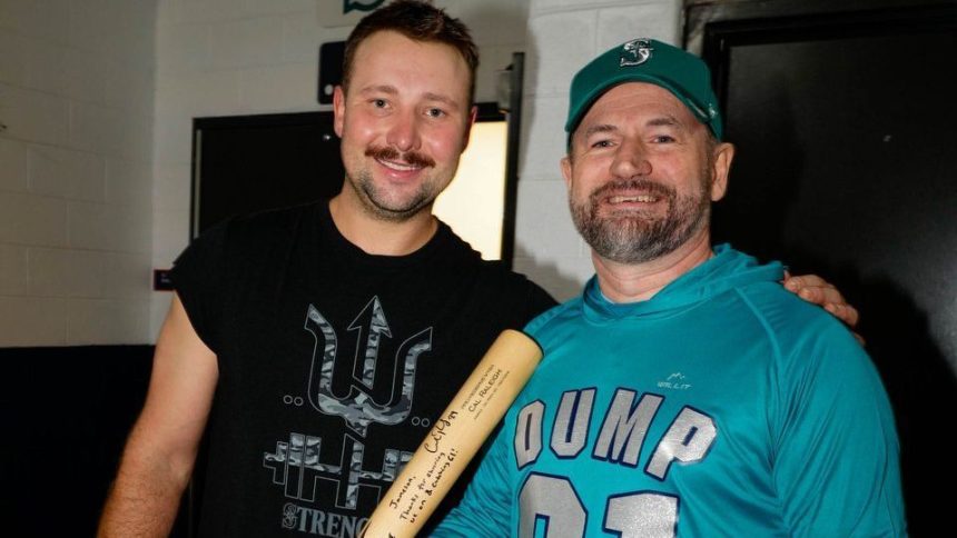 Mariners’ Cal Raleigh sends first postseason homer to fan in ‘Dump Here’ shirt