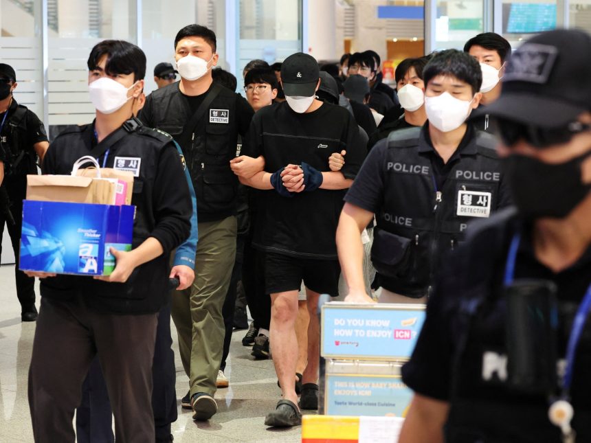 South Koreans freed from Cambodian scam centres return home under arrest | Cybercrime News