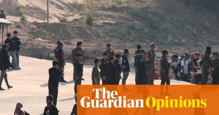 The Guardian view on the online scam industry: authorities must not forget that perpetrators are often victims too | Editorial