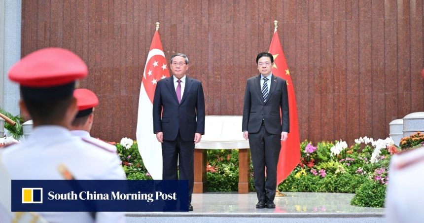 Singapore, China pledge to fight for free trade as Li Singapore, China pledge to fight for free trade as Li Qiang visits city state