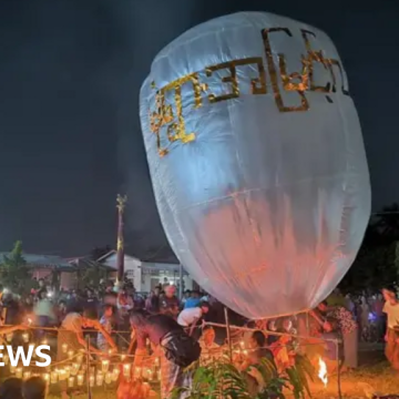 At least 24 killed as paraglider bombs Buddhist festival