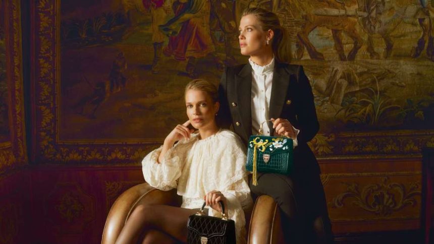 Lady Amelia and Lady Eliza Spencer  in the Aspinal of London 2025 holiday campaign.