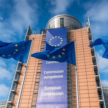 EC finds Meta and TikTok breached transparency rules under DSA European Union flags waiving in front of Berlaymont building in Brussels