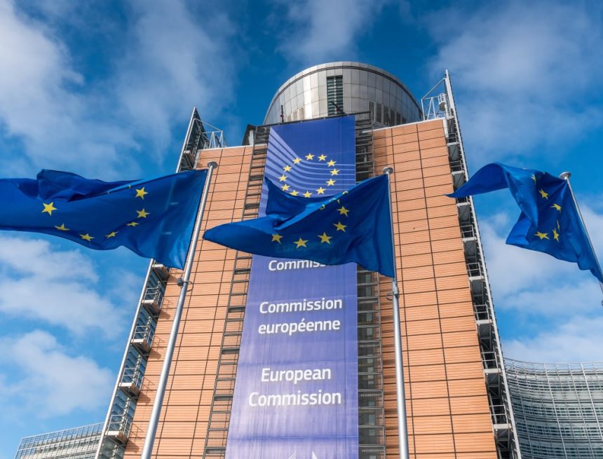 European Union flags waiving in front of Berlaymont building in Brussels