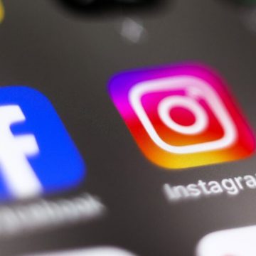 EU accuses Meta of violating content rules in move that Facebook and Instagram app icons on a phone screen.
