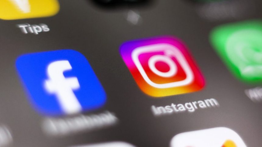 EU accuses Meta of violating content rules in move that Facebook and Instagram app icons on a phone screen.