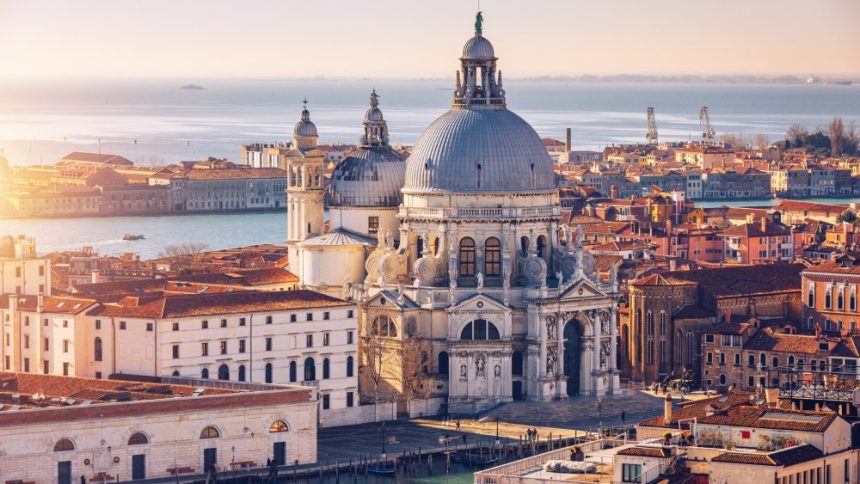 Fashion's Sustainability Journey Unpacked at 2025 Venice Forum Aerial View of the Grand Canal and Basilica Santa Maria della Salute, Venice, Italy. Venice is a popular tourist destination of Europe. Venice, Italy.