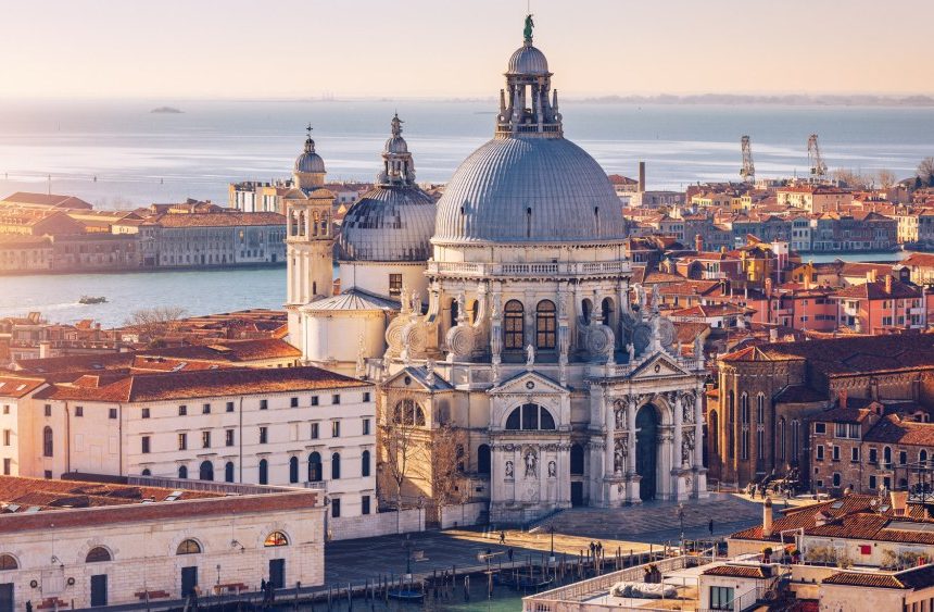 Aerial View of the Grand Canal and Basilica Santa Maria della Salute, Venice, Italy. Venice is a popular tourist destination of Europe. Venice, Italy.