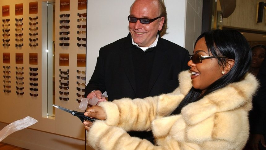 Former Luxottica Vice President Ed Jankowski Dead at 72 Lil' Kim cutting the ribbon and Ed Jankowski, COO of Solstice