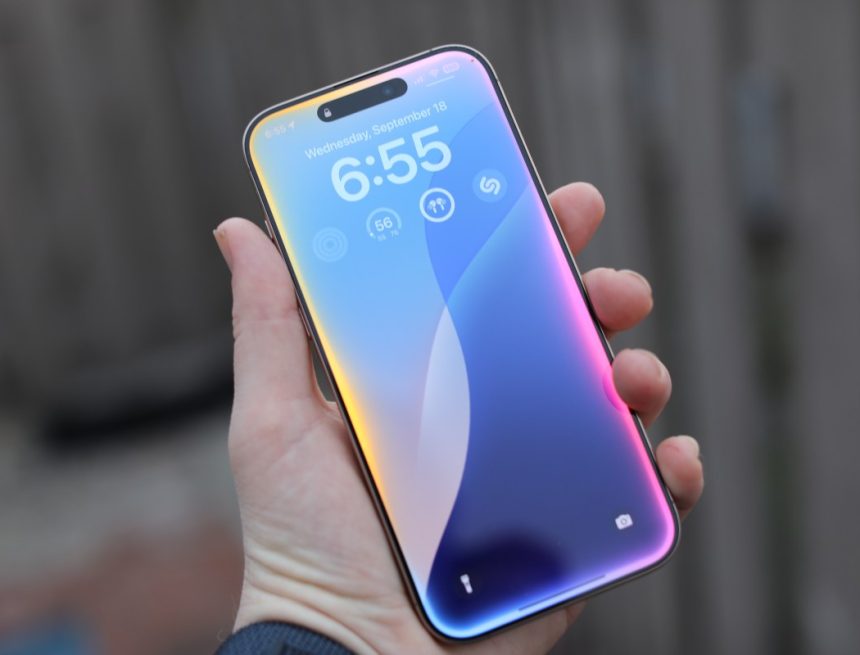 iPhone 16 Pro Max Siri held in hand