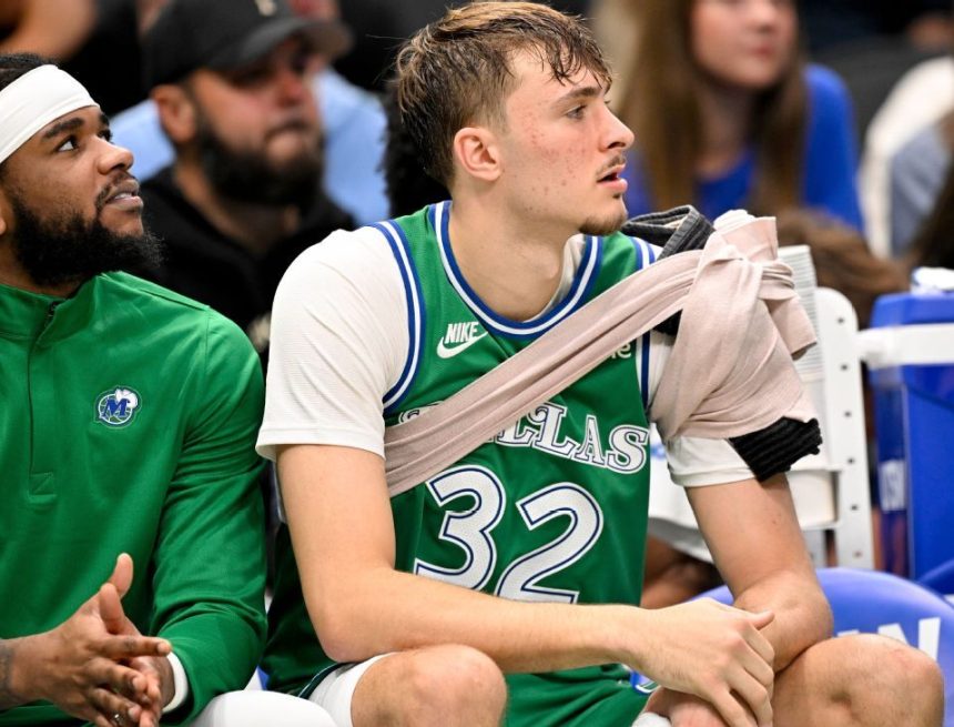 Mavs' Cooper Flagg hurts shoulder, is benched in crunch time
