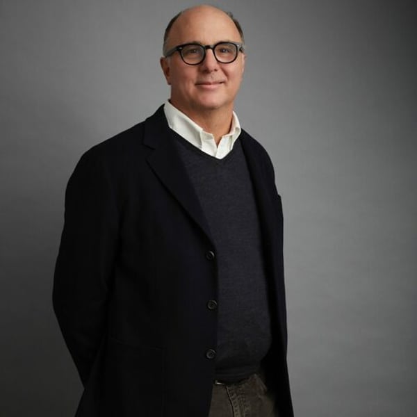 Prada CEO Andrea Guerra says Versace deal set to close Prada CEO Andrea Guerra says Versace deal set to close in fortnight, no approach made by Armani