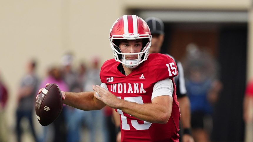 Report Card Grades for Top 20 College Football QBs After Week 8