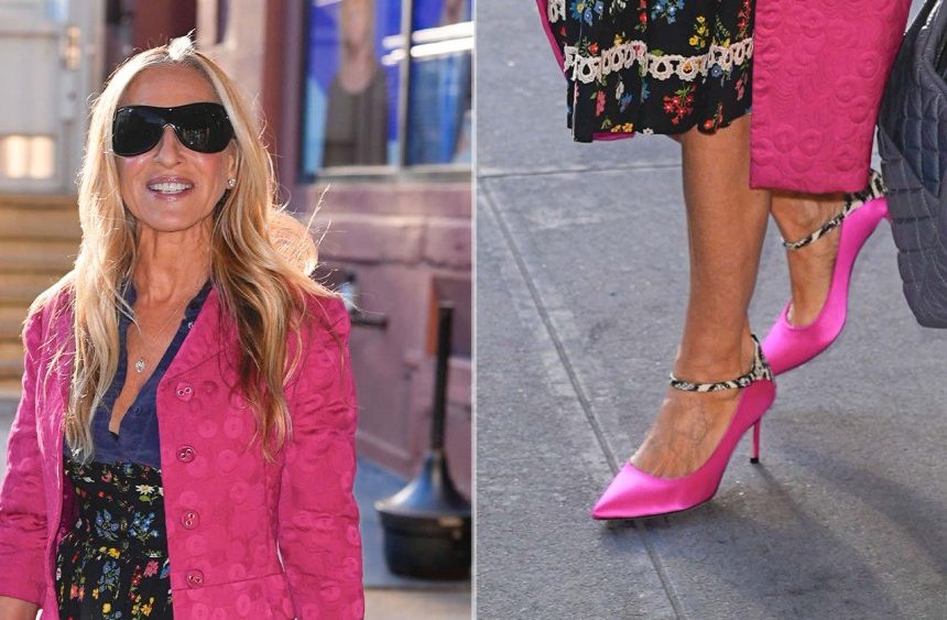 Sarah Jessica Parker wearing Breast Cancer Awareness Month-pink pumps with a snakeskin ankle strap in Nnew York on Thursday.