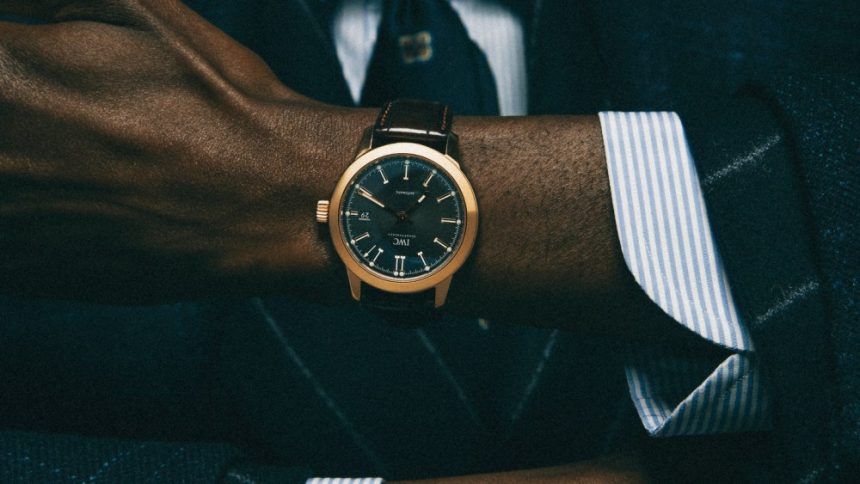 IWC Ingenieur vintage watch; Cesare Attolini wool jacket, suit, cotton shirt and tie; Celine Homme by Hedi Slimane belt.