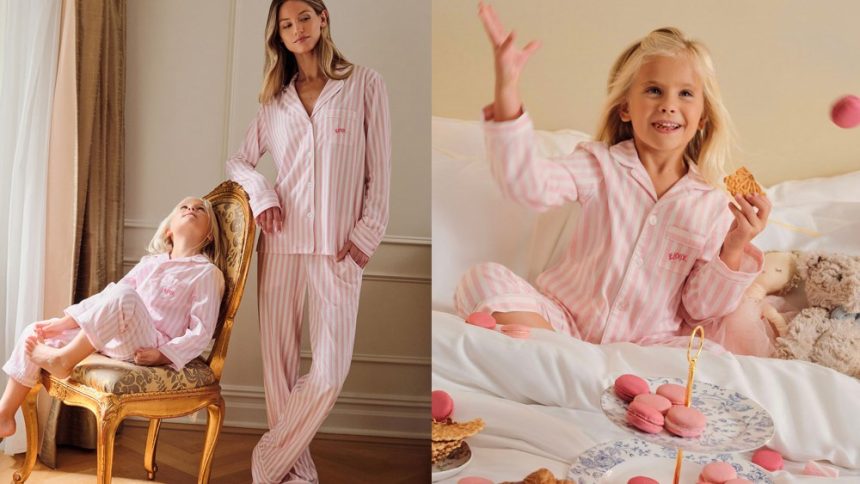 woman and girl wearing matching striped pajamas; girl sitting in bed while eating sweet treats and wearing said pajamas