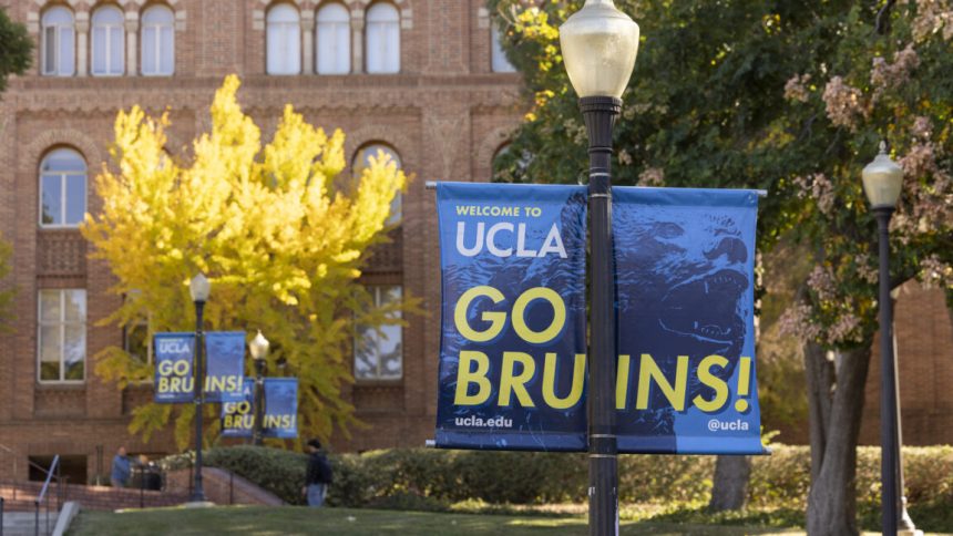 Trump’s UCLA deal: Pay us $1B+, and we can still Image of a UCLA banner in front of brick buildings on a campus.