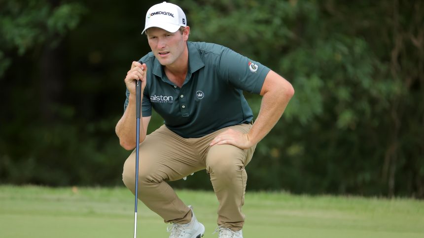 Vince Whaley Hits Shot While Standing in Lake With Alligator in Water Nearby on Video