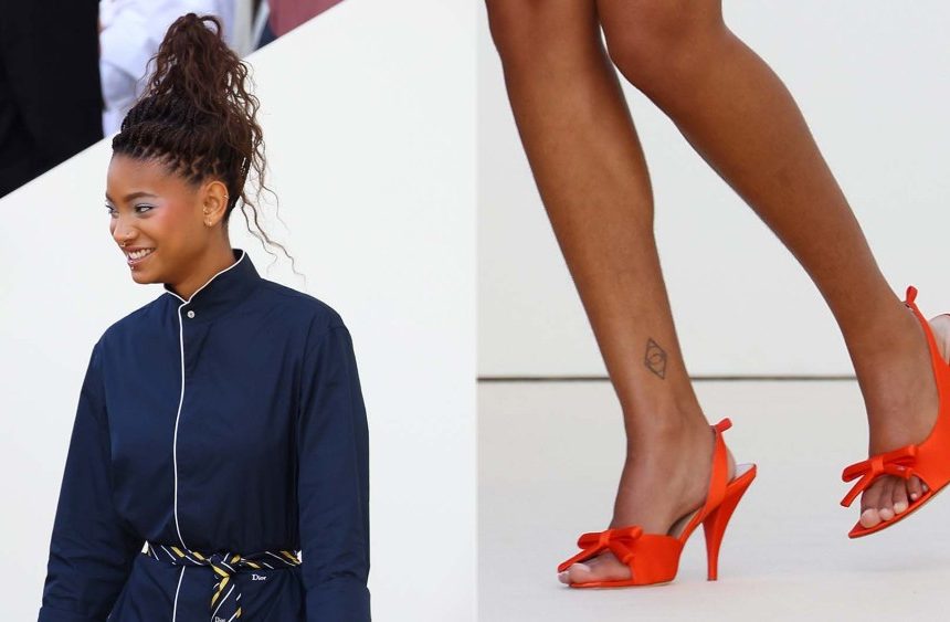 Willow Smith wears vibrant orange slingback pumps with a bow on the vamp at the Christian Dior Womenswear spring 2026 show as part of Paris Fashion Week on Wednesday in Paris.