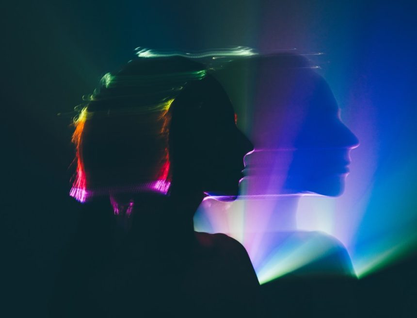 Blurred portrait of a woman taken with long exposure, concept of surrealism and spirituality.