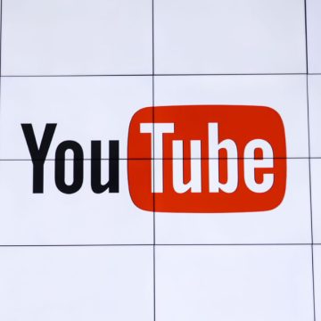 YouTube logo, displayed inside a series of TV panels at YouTube TV's launch.
