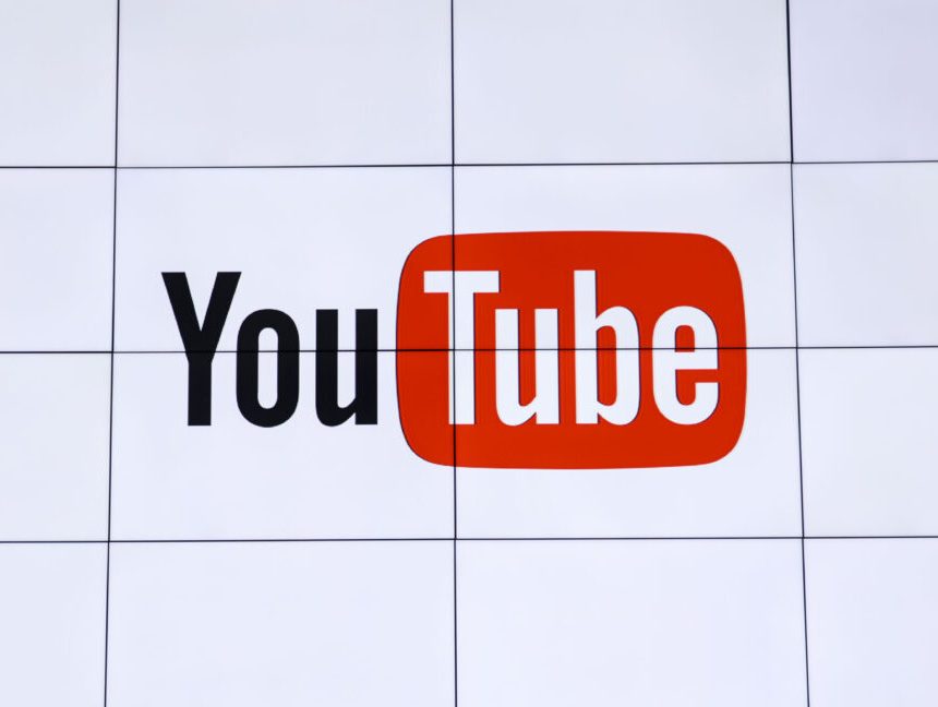 YouTube logo, displayed inside a series of TV panels at YouTube TV's launch.