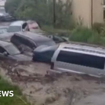 Cars swept away as floods hit country’s south-east