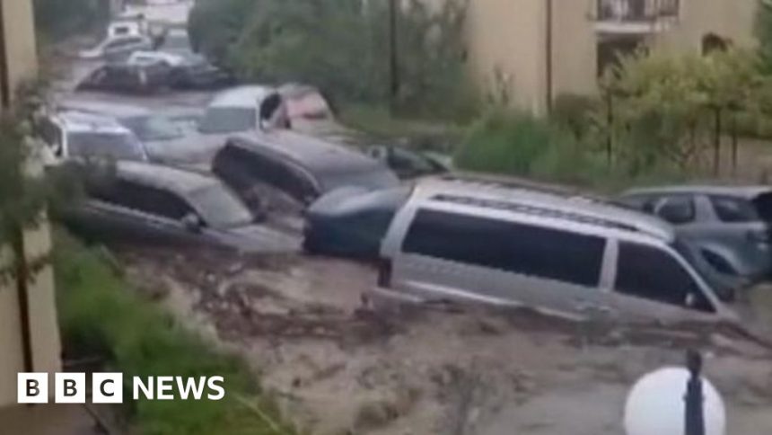 Cars swept away as floods hit country’s south-east