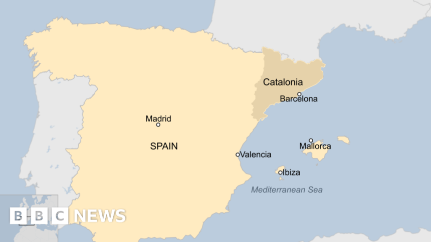 Floods trap people in cars in Spain’s Catalonia region