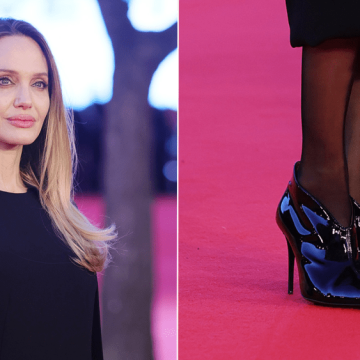 Angelina Jolie wears V-cut patent leather booties at the Rome premiere. of"Couture" on Saturday.