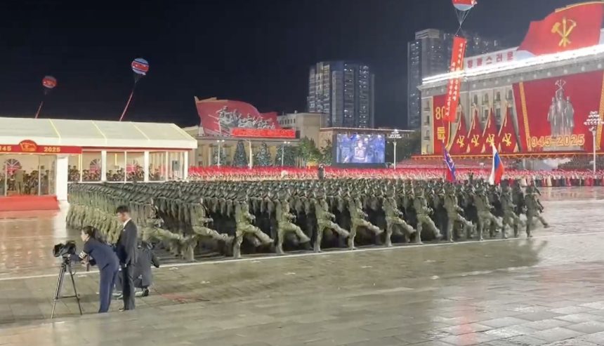 North Korea showcases new long-range nukes at rain-soaked military parade