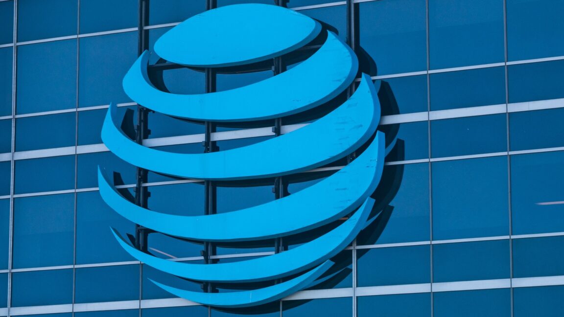 A large AT&T logo seen on the outside of its corporate offices.