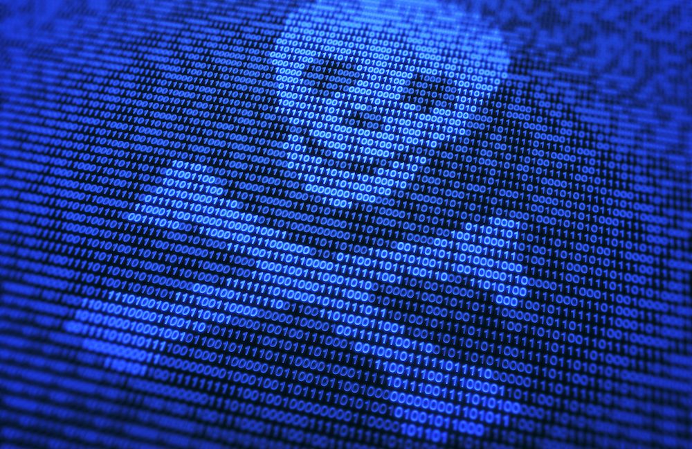 A stylized skull and crossbones made out of ones and zeroes.