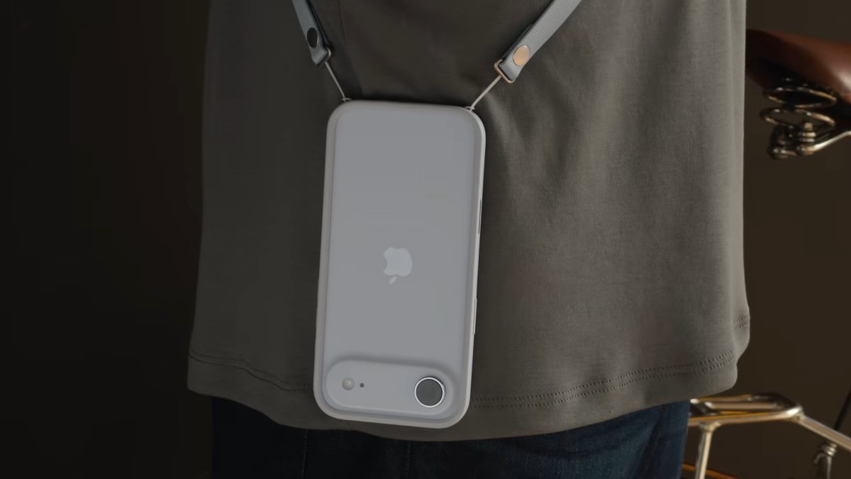 iPhone hanging from Apple Crossbody Strap