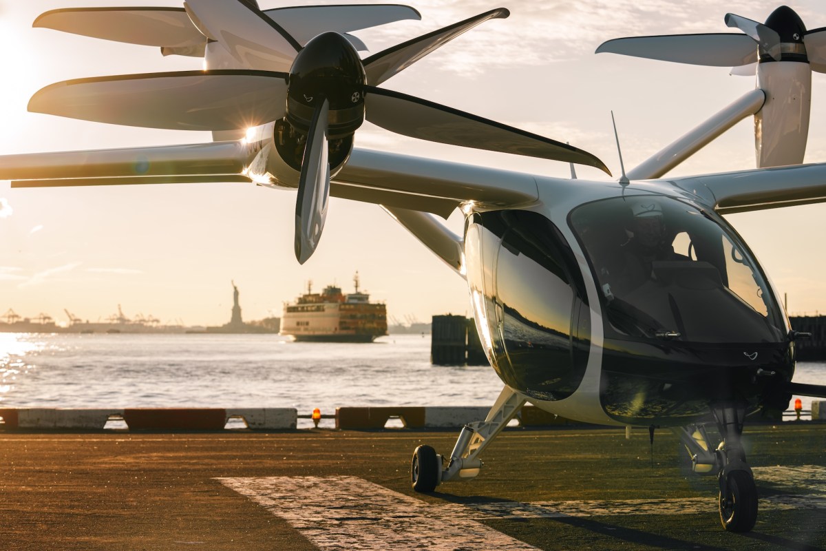 Joby Aviation EVTOL parked on tarmac next to water