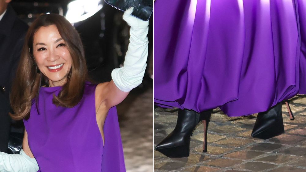 Michelle Yeoh wears Amina Muaddi black leather Yigit platform boots with a bespoke Balenciaga dress at the Paris premiere of "Wicked: For Good" on Friday night.