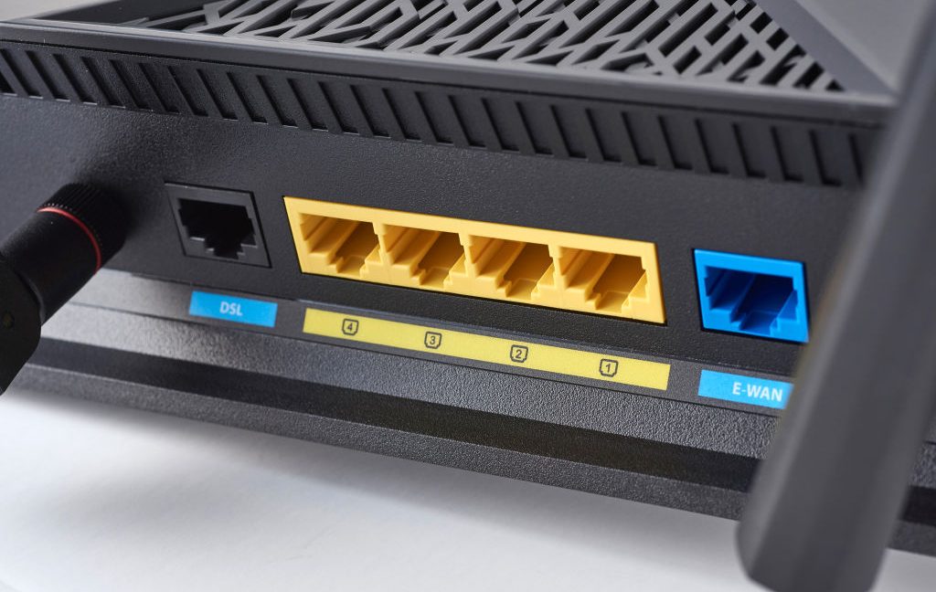 Ethernet ports on an Asus router.