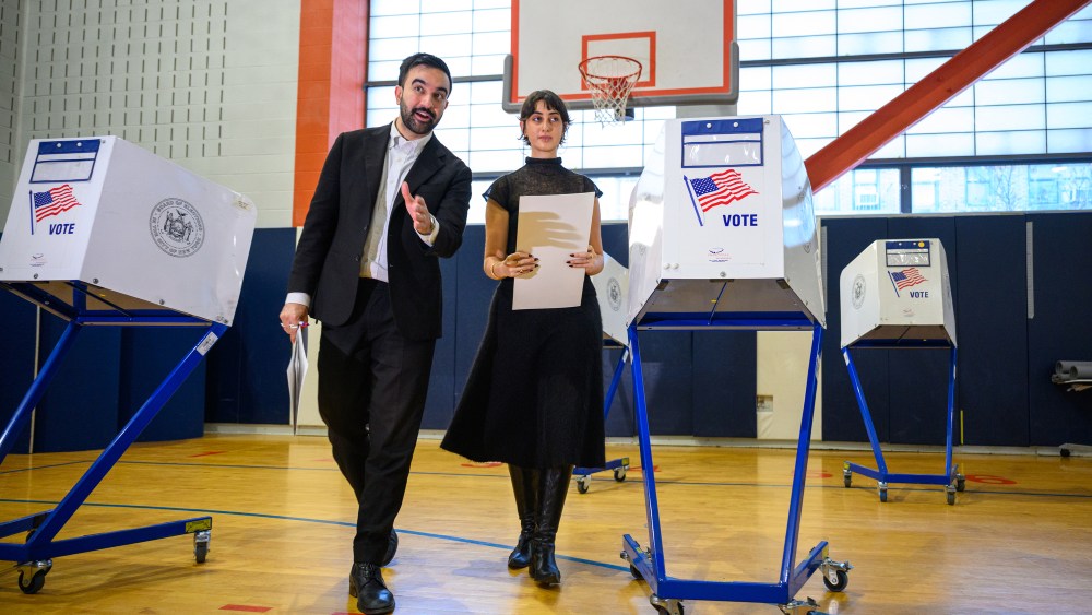 Democratic Mayoral Candidate Zohran Mamdani and his wife, Rama Duwaji, votes at The Frank Sinatra School of the Arts on November 04, 2025 in the Queens borough of New York City. Voters in NYC are voting for who will be replacing Mayor Eric Adams between the front runner New York Mayoral Candidate Zohran Mamdani and New York City mayoral candidate Andrew Cuomo and Republican mayoral candidate Curtis Sliwa. More than 735,000 people have voted early, according to the Board of Elections, more than four times as many as in the 2021 contest. This election also has other city offices on the ballot, as well as six proposals.