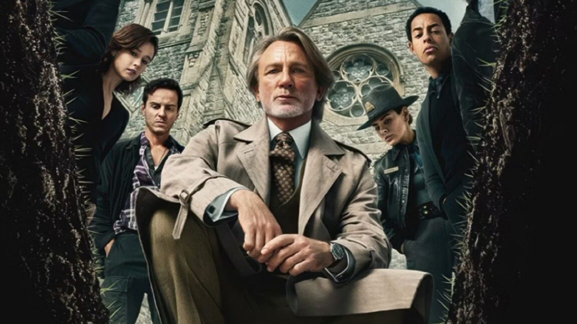 Benoit Blanc in light tan suit kneeing while standing suspects are arranged behind him in front of a church