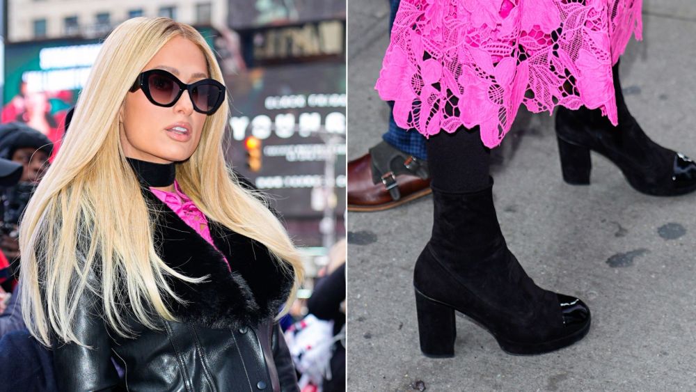 Paris Hilton wears Chanel cap-toe sock boots on her way to the Baby Three x T-Mobile “No Filter Series” launch in Times Square on Saturday.